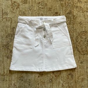 Cute little white button down miniskirt, Size 10/12.